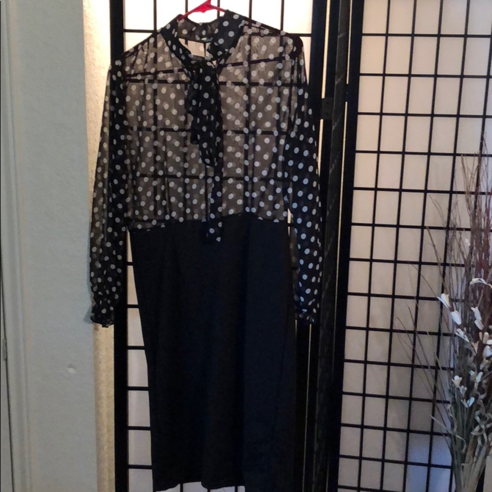 One piece Dress.  Never worn but without tags